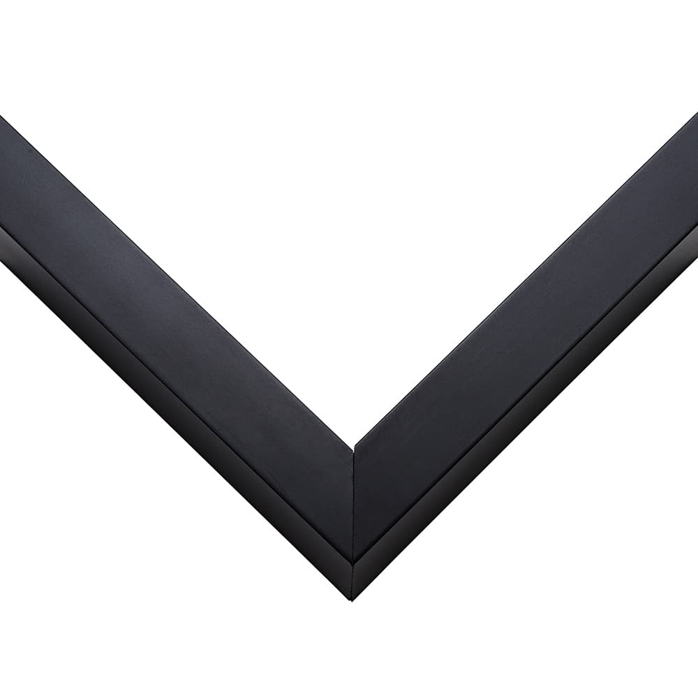Wide Black picture frame corner detail showing clean 1.125 inch block profile with rich black finish and precision mitered joint