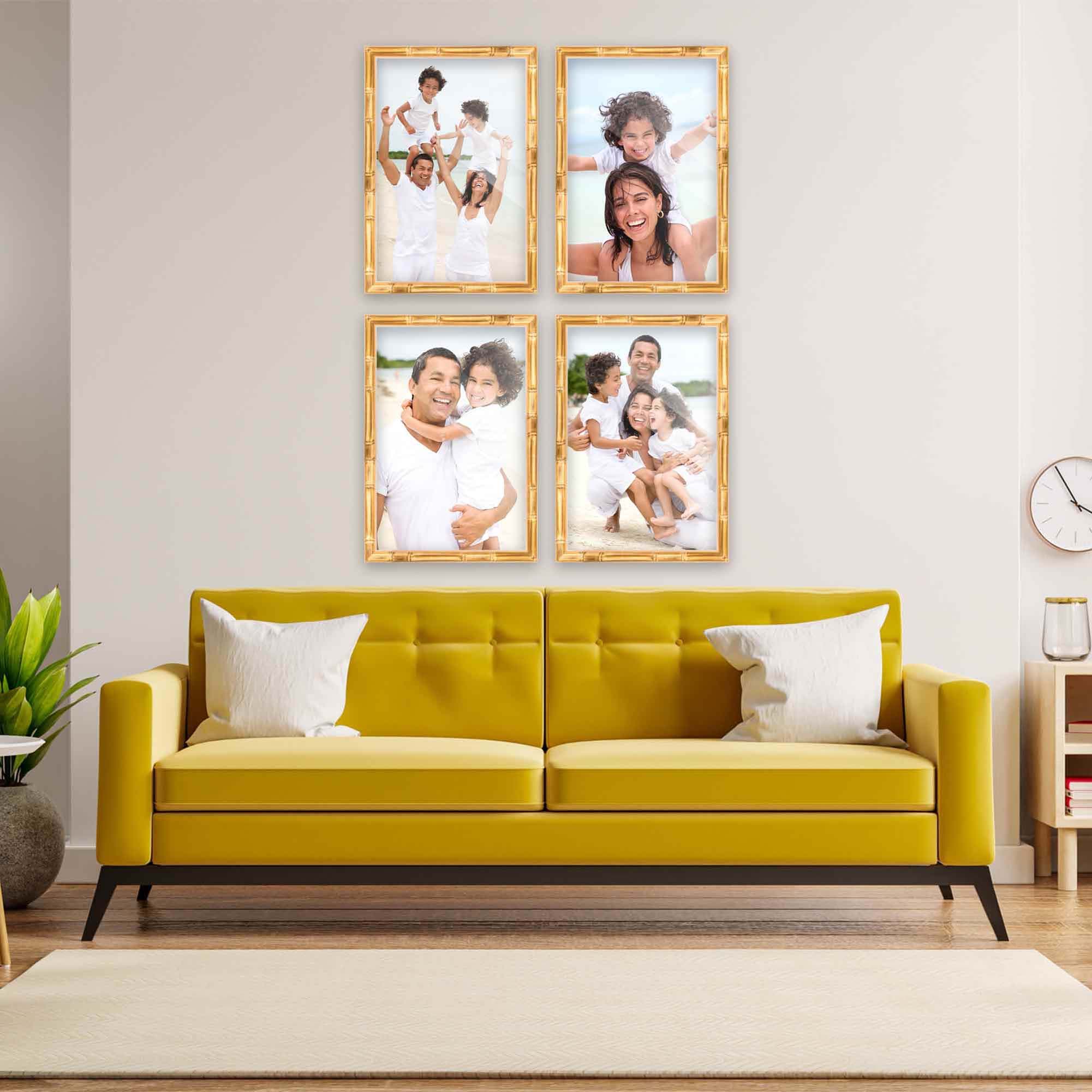 Four large Gold Bamboo custom frames above contemporary yellow sofa displaying family portraits in matching metallic gold finish perfect for formal living spaces
