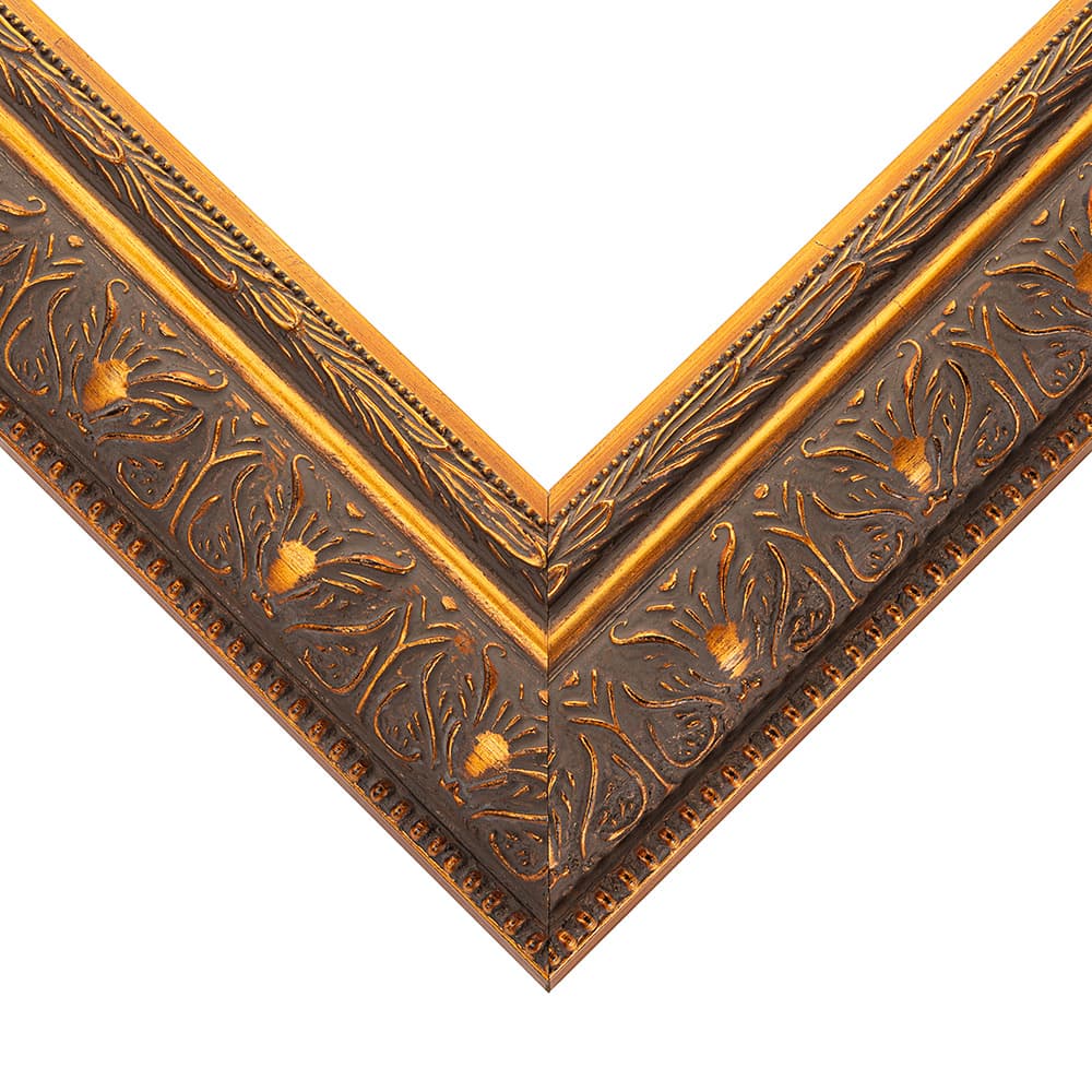 Wide Picture Frame corner detail showing ornate hand-carved floral patterns with metallic gold finish and precision mitered joint in 2.5 inch profile